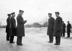 Maj Rockwell presenting Purple Hearts to injured Marines February 3, 1945