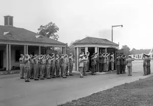 CAPT Fisher being piped off station July 18, 1945