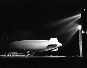 NAST blimp at night